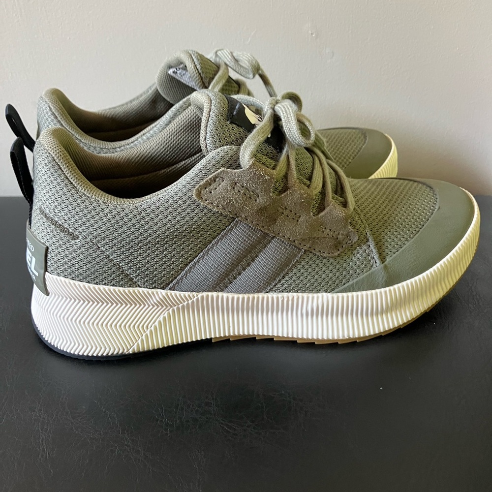 Sorel Women's Out N About III low waterproof sneaker in Olive Green
